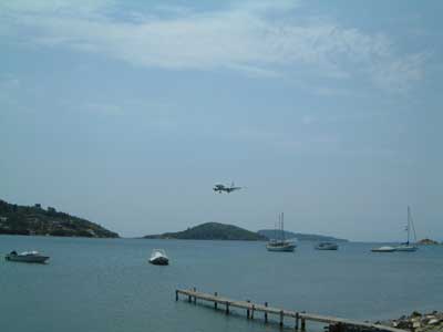 Incoming airplane at Skiathos town